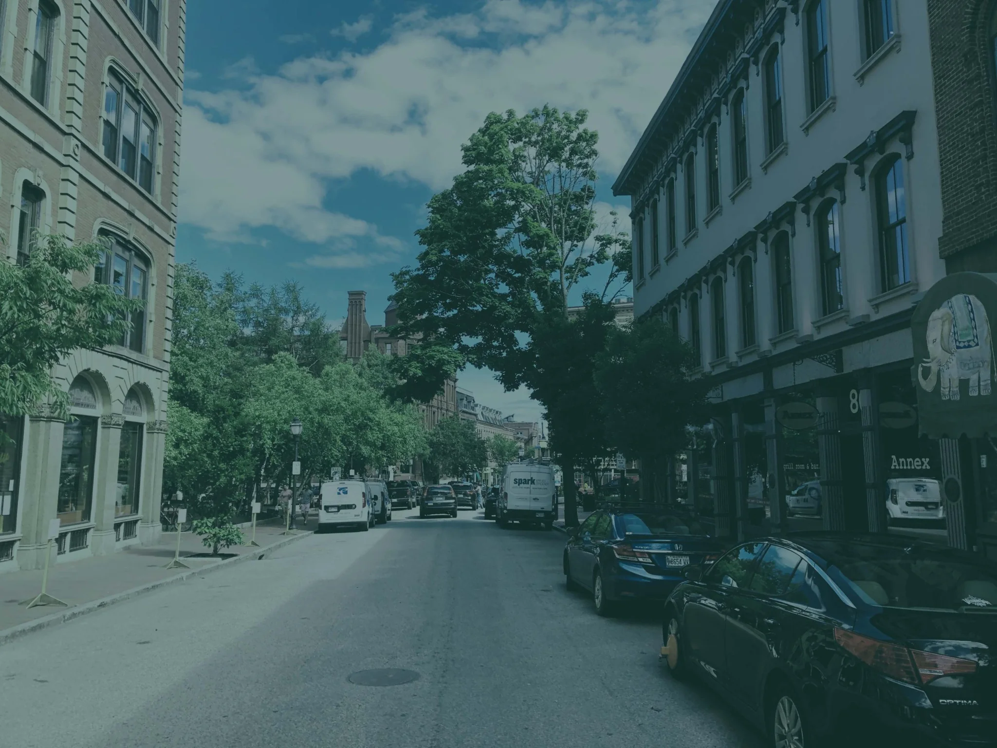 Portland downtown street lined with brick and stone buildings